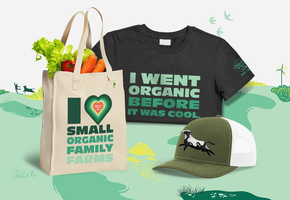 A t-shirt, tote bag, and a hat with Organic Valley branding